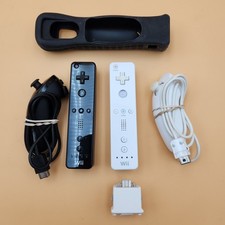Lot Of 2 OEM Nintendo Wii Remotes White/Black W/ 2 Nunchuck's  1 Motion Plus