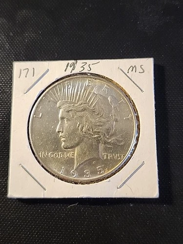 1935 Silver Peace Dollar In Brilliant Uncirculated Condition
