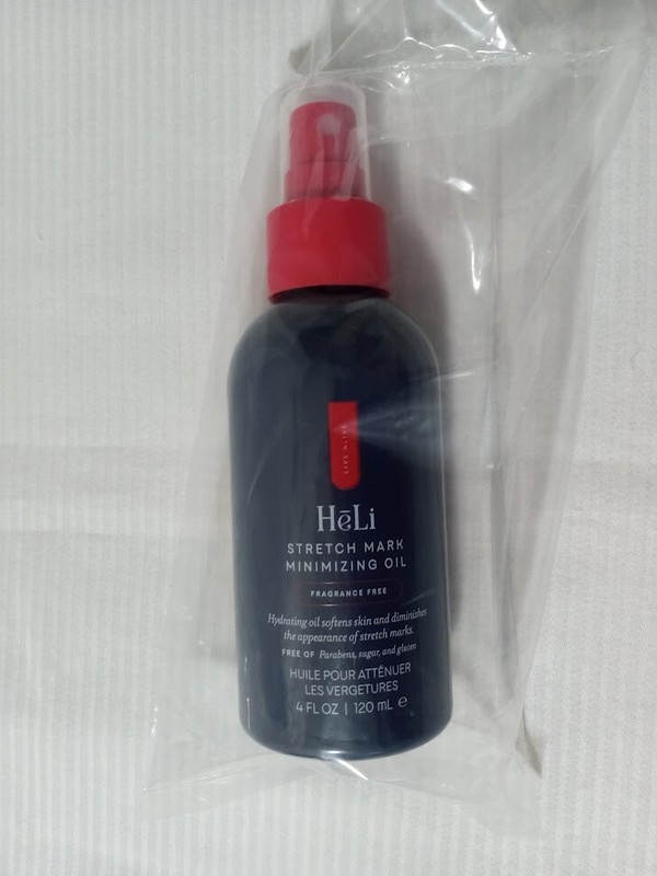 Pure Romance- Heli Stretch Mark Minimizing Spray Oil- New Sealed!