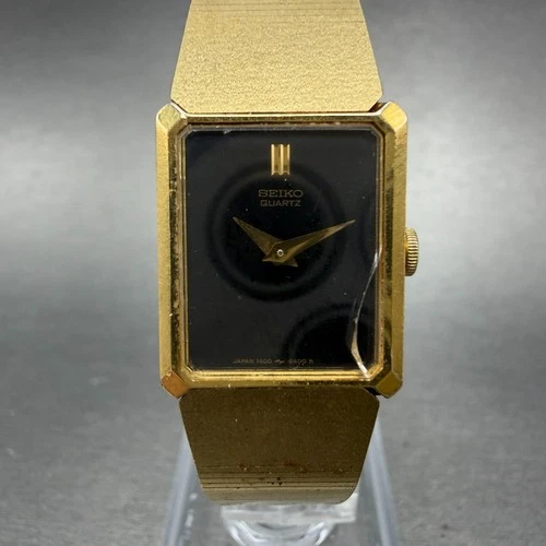 Seiko Watch Women 17mm Black Dial Gold Tone Rectangle 1400-8479 New Battery VTG