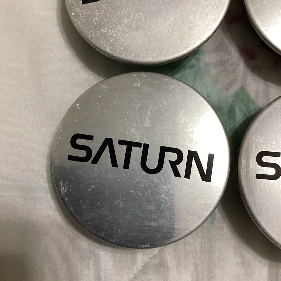 Juego de 4 Tapacubos Centro Saturn L200 L300 OEM 9593169 9594156 9595157 Foto 2 de 4
