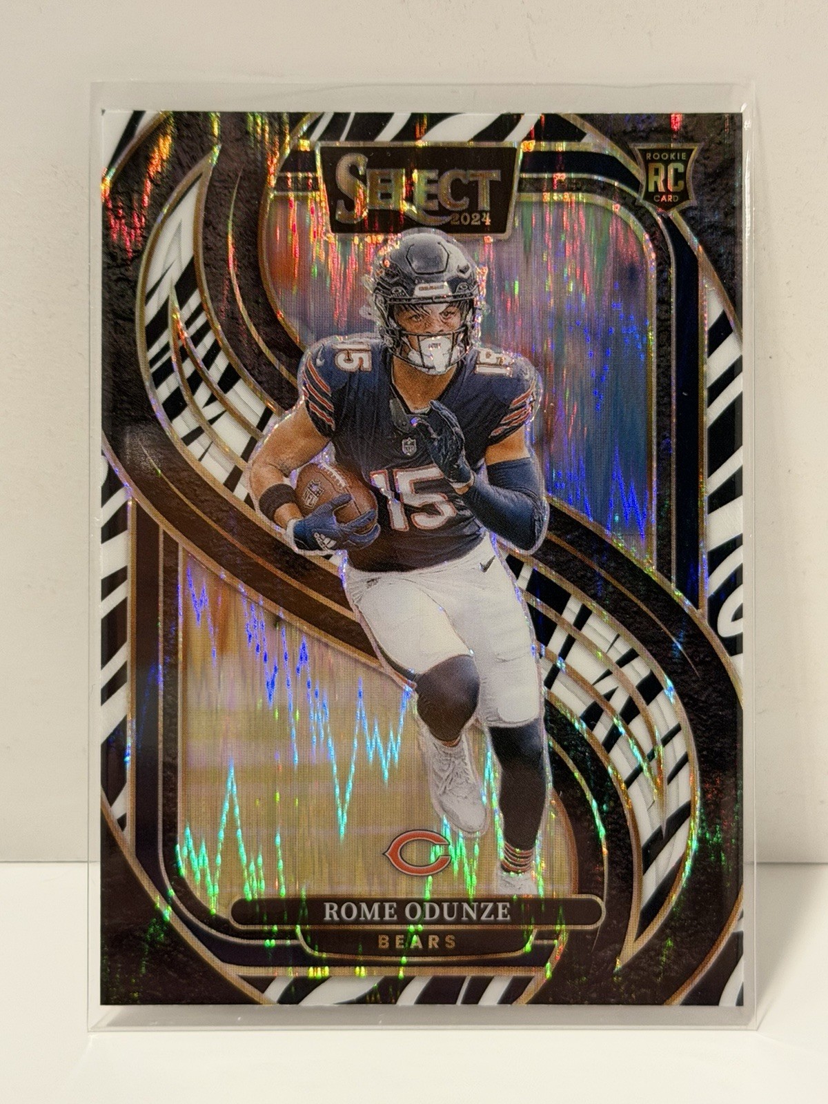 2024 Panini Select - Premier Level Rome Odunze #136 Zebra Shock Prizm (RC)