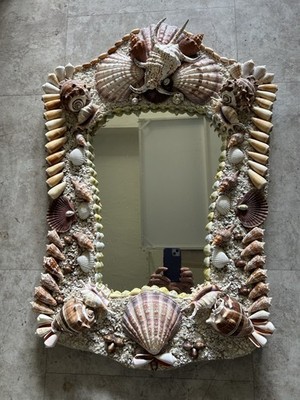 Mirror with shell frame