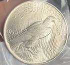 1923 Peace Dollar. Sold As Uncirculated By Littleton Coin.