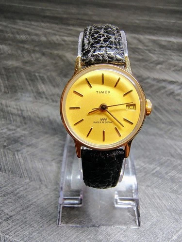 Vtg. Ladies Gold Toned Manual Wind Timex Watch W/ Date