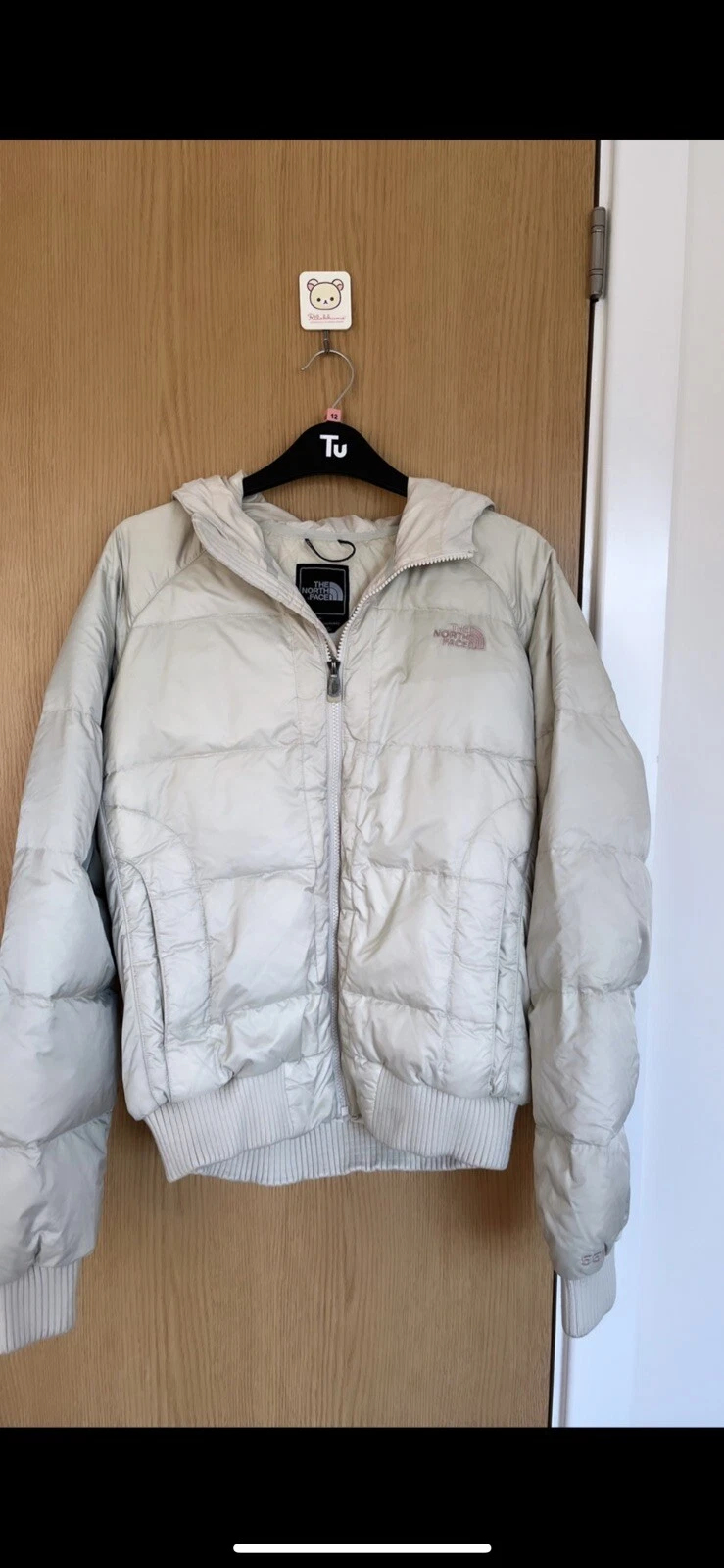 beige north face puffer jacket