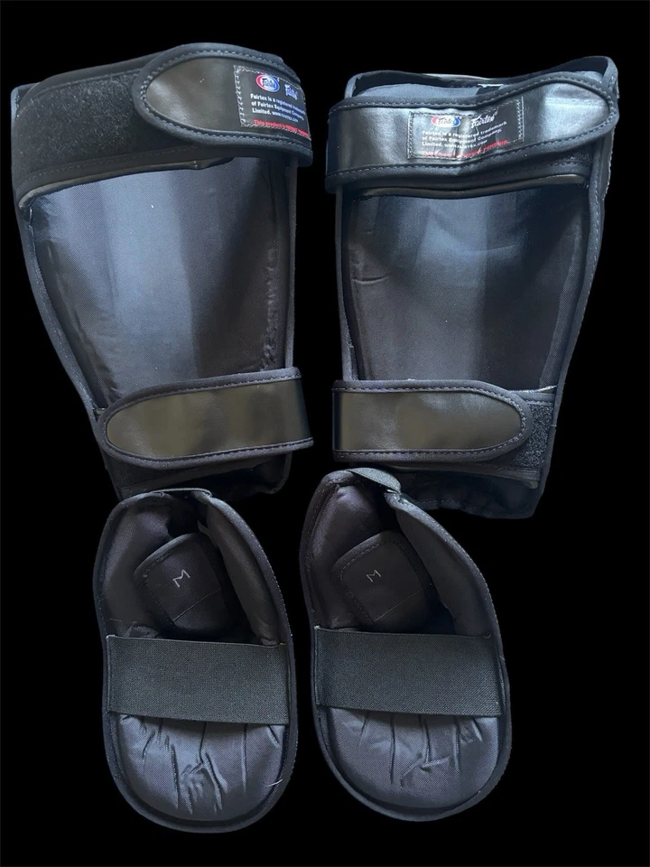 FAIRTEX SP7 ESPINILLERAS RETORCIDAS NEGRAS MUAY THAI KICK BOXING MMA K1 SEGURIDAD Foto 2 de 2