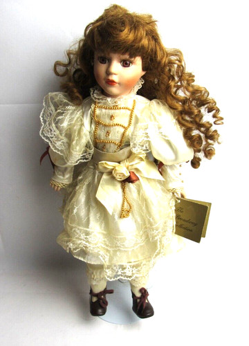 The Broadway Collection Porcelain Doll Brunette with Brown eyes