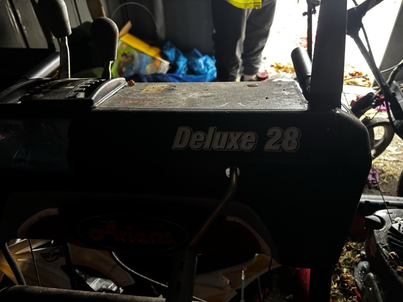 Ariens Deluxe 28 28 in Two-Stage Gas Snow Blower w/ Auto-Turn, Red/Black