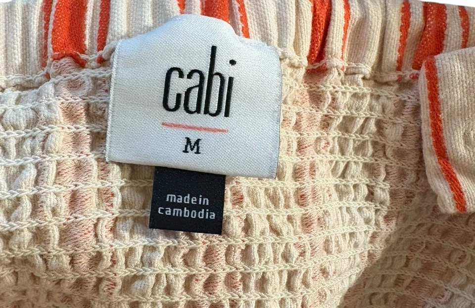 Top sin mangas a rayas naranja crema Cabi para mujer babydoll mediano con tiras Foto 4 de 4