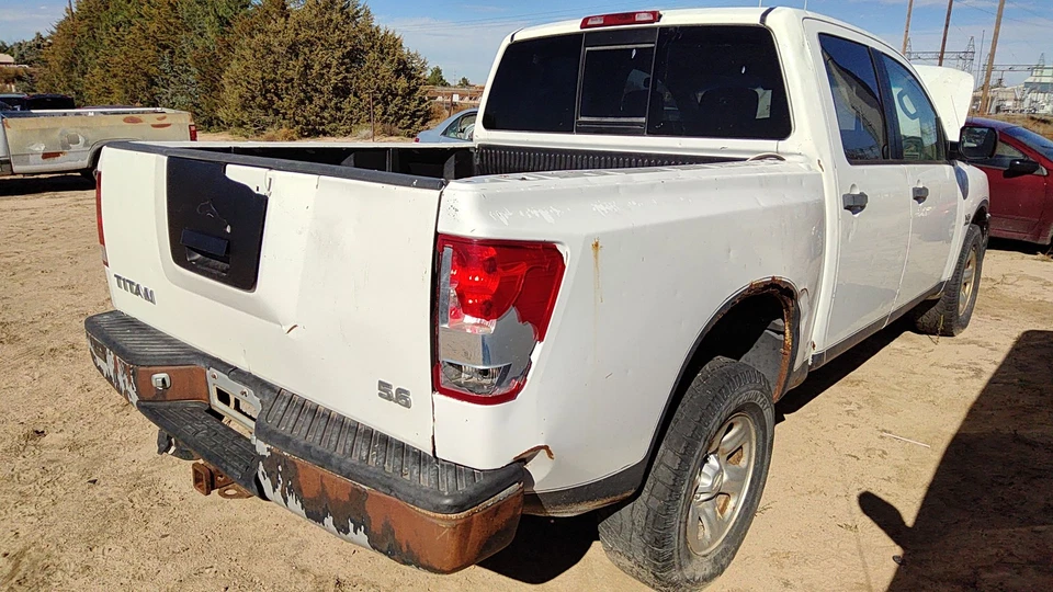 Pinza de freno trasera izquierda Nissan Titan 2004-2015 conductor con soporte de montaje trasero Foto 3 de 4