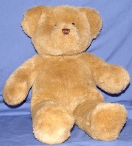 teddy bear with stitched eyes