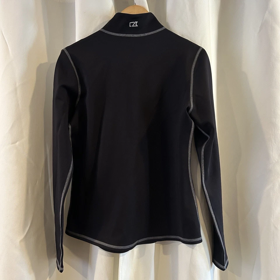 Pullover grande con tapeta a presión Cutter & Buck 50+ UPF elástico verde perenne 1/4 para mujer Foto 3 de 4