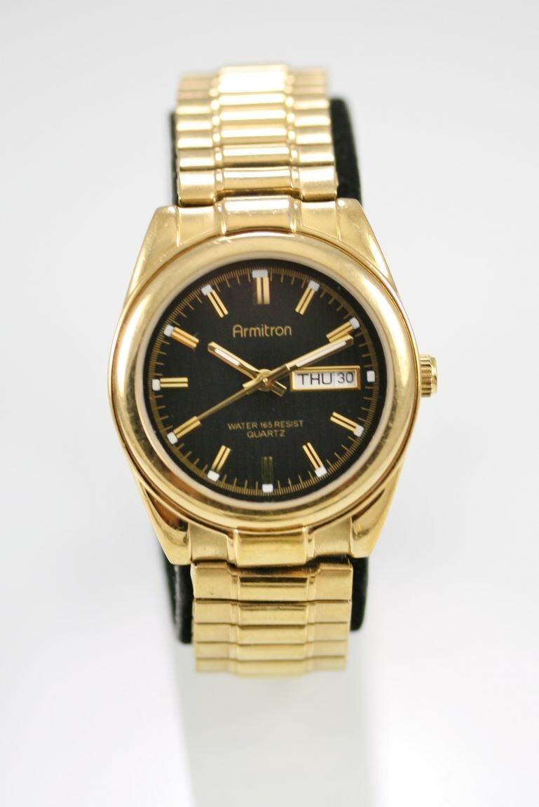 Armitron watch gold and black new arrivals