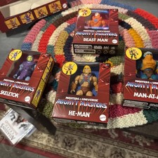 MOTU Mighty Masters lotto di 8 con espositore He-Man Skeletor Man-at-Arms Beast Man