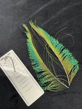 Peacock  feathers multiple types as shown in photos from Lucas Collection