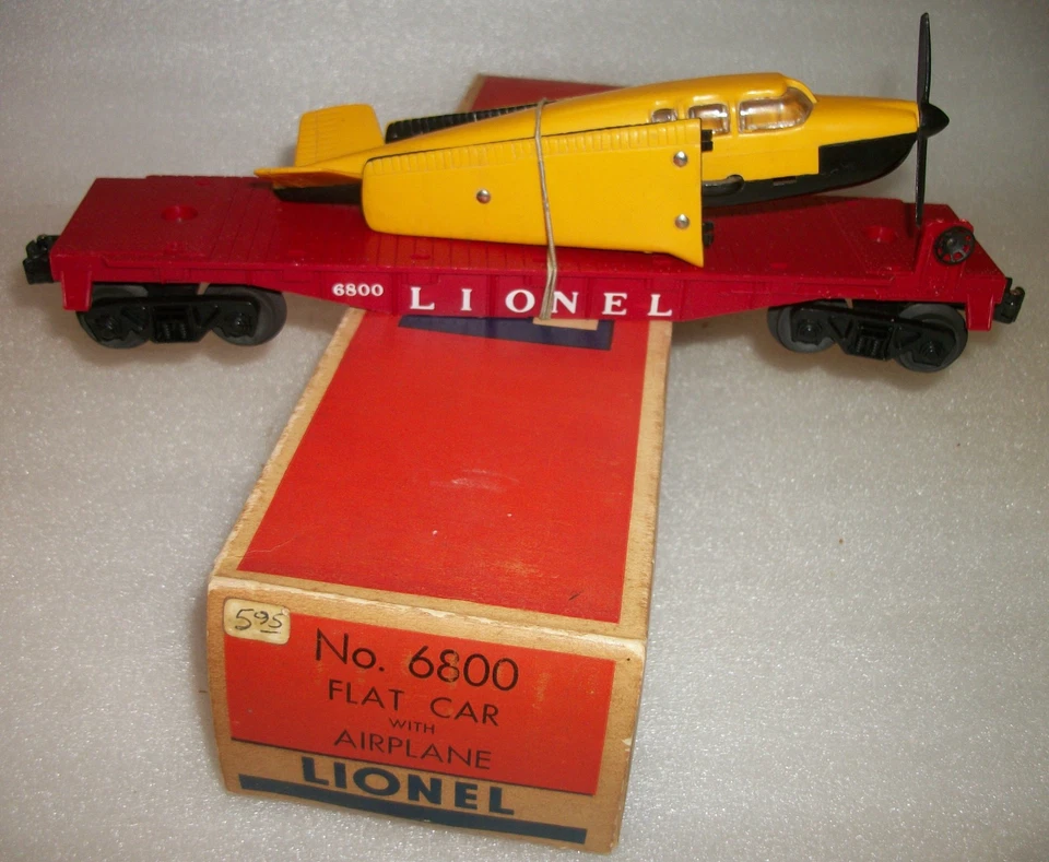 LIONEL POSGUERRA 6800 COCHE PLANO CON AVIÓN AMARILLO OSCURO/NEGRO COMO NUEVO SIN USAR OB INSTR Foto 3 de 4
