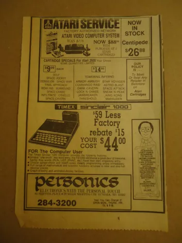 Atari Video Computer System with cartridges  1983 ad