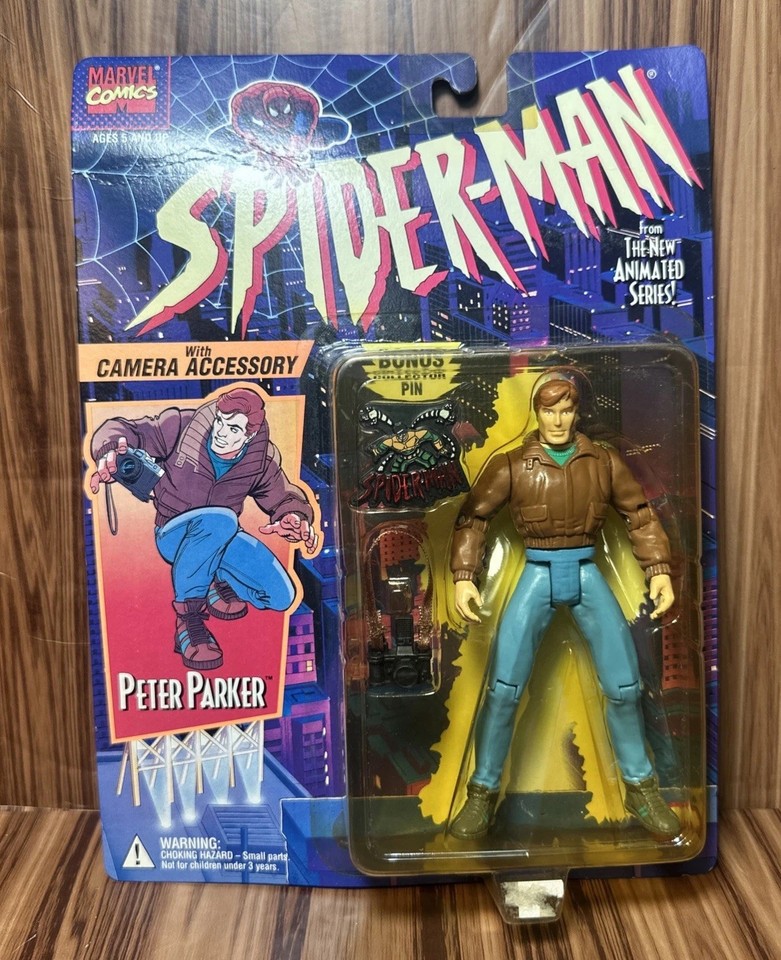 A 1994 Toy Biz Peter Parker with his camera — not Spider-Man in costume, but Peter Parker the photographer, making it one of the more conceptually clever Marvel figures ever made.