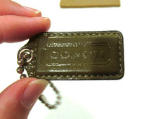 Coach green leather bag tag/charm
