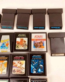 Atari 7800 console with 35 games, 2 controllers, power cord, storage case WORKS