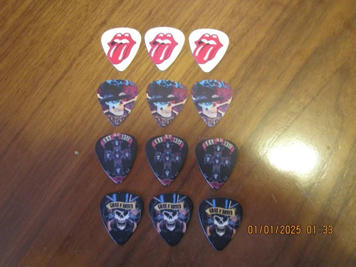 Lot of 12 Assorted Bands Guitar Picks - See Pics - Medium Gauge A59