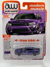 Auto World Modern Muscle - 2023 Dodge Charger R/T Scat Pack Plum Crazy 