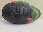 Black and green Teenage Mutant Ninja Turtles football Raphael with textured silver and red sole.