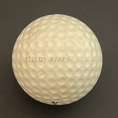 3 Vintage Hogan Golf Balls -one with advertising New York Telephone Yellow Pages