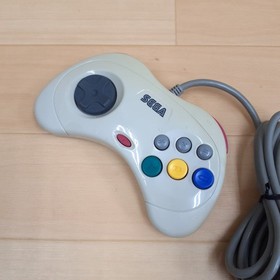 Sega Saturn console with Hori Fighting Stick, Virtua Gun, 5 games & memory Japan