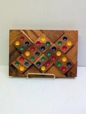 Wood Brain Teaser Puzzle. Color Match. Brook stones.