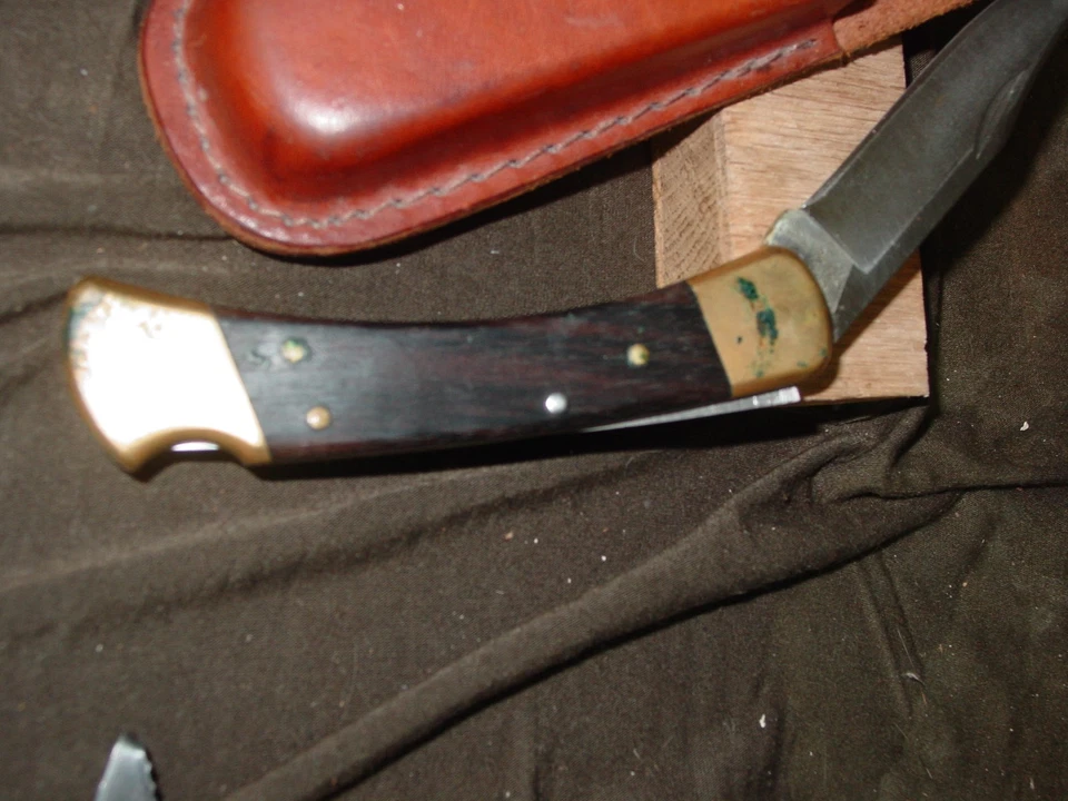 Cuchillo Buck - Modelo 110 - Plegable con Estuche de Cuero Shrade - 1987 Foto 3 de 4