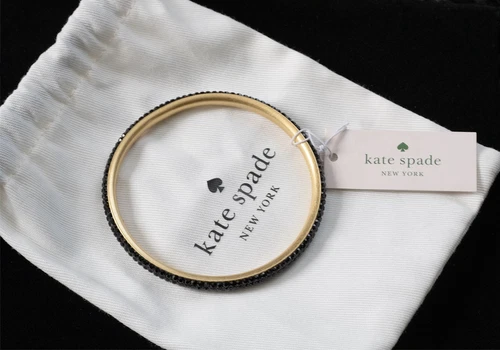 Bracciale Kate Spade Razzle Dazzle oro e zirconi neri