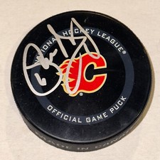 PHIL HOUSLEY Signed Calgary FLAMES Official GAME Puck Beckett (BAS)