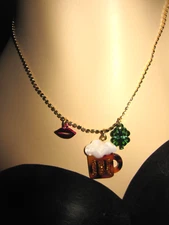 BETSEY JOHNSON ST PATRICKS DAY LUCKY CHARM BEER CLOVER AND LIP CHARM NECKLACE