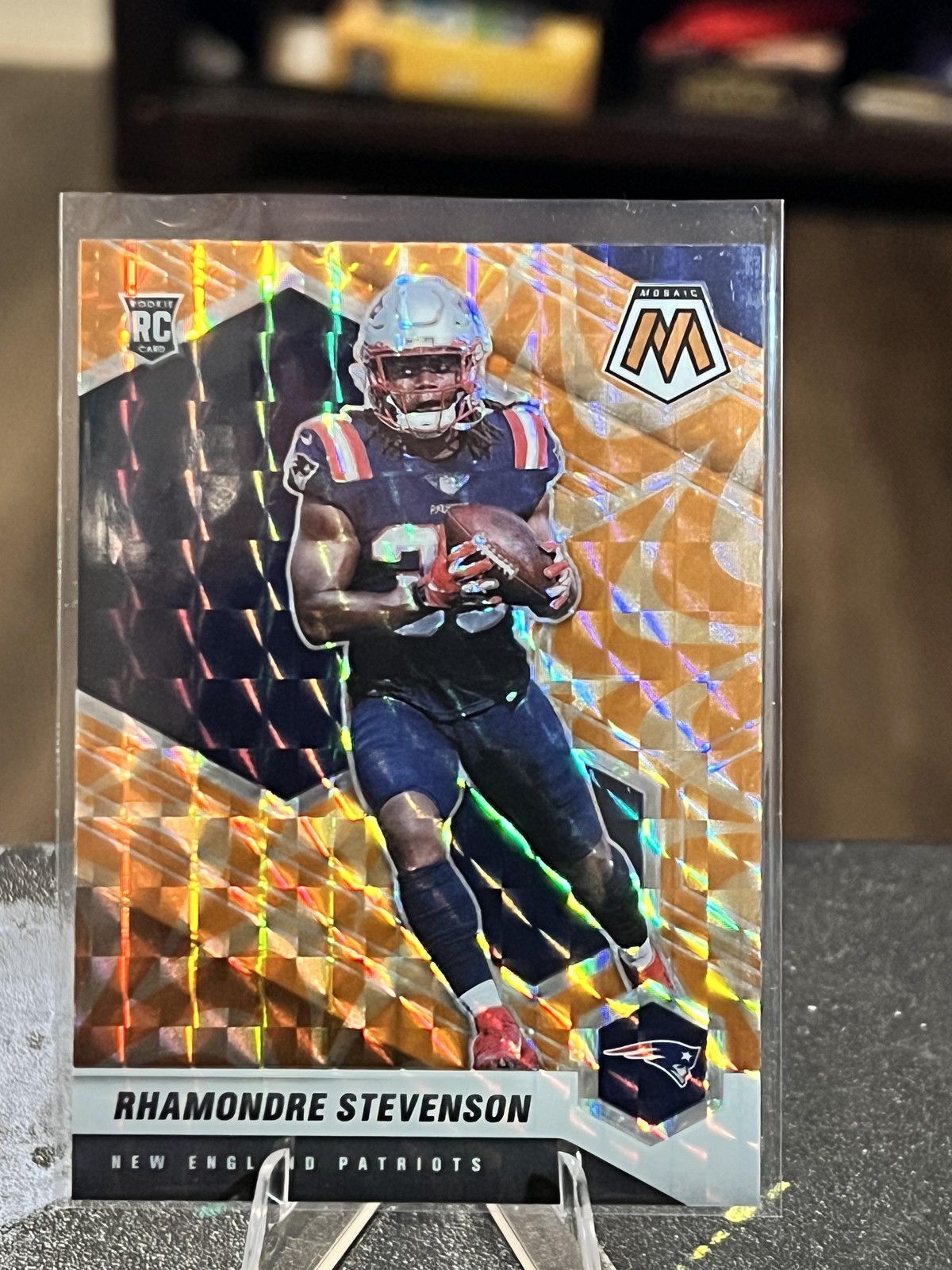 2021 Panini Mosaic #337 Rhamondre Stevenson Prizm Reactive Orange