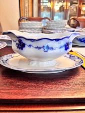 vintage gravy boat with attached underplate