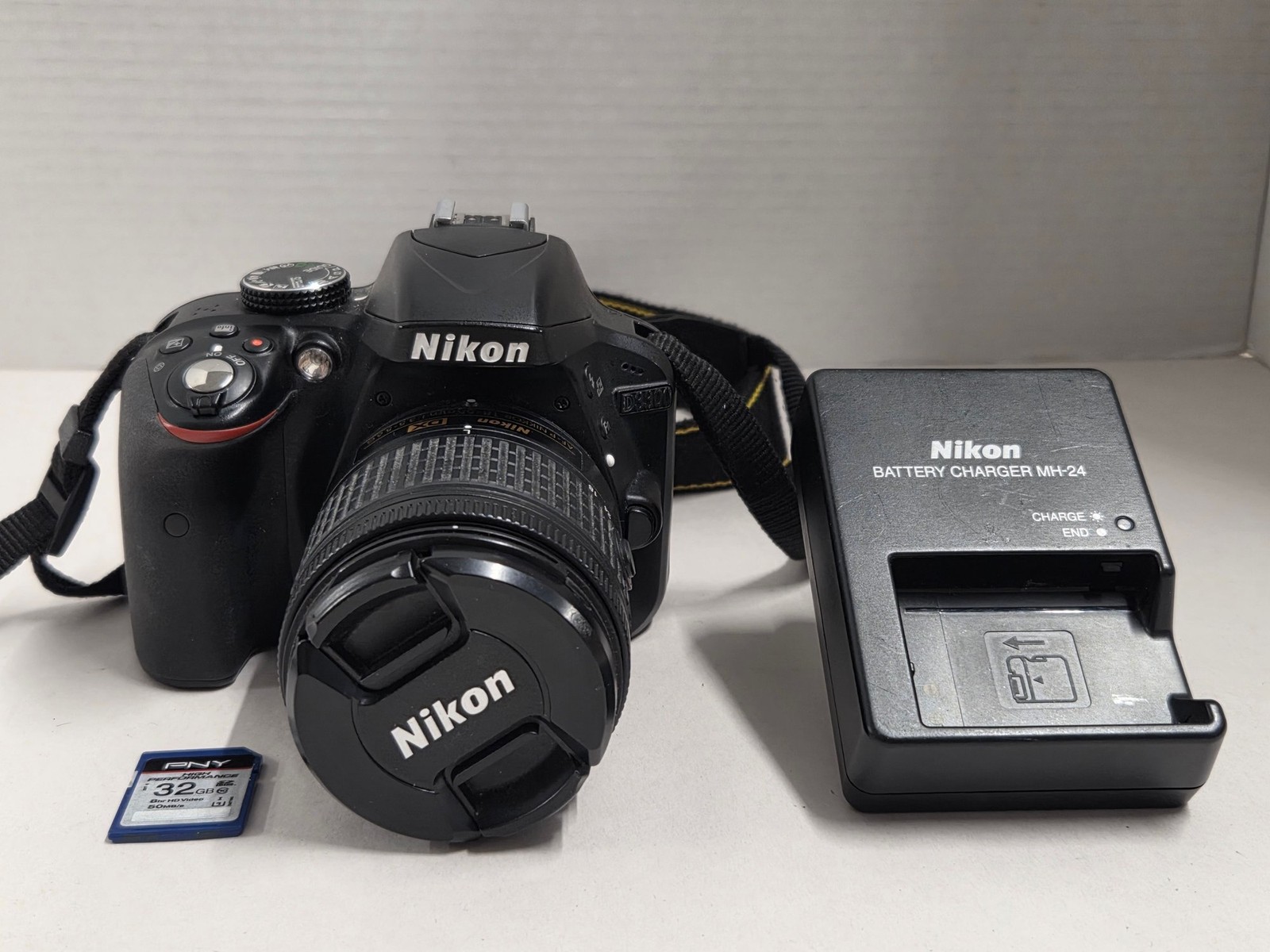 Nikon D3300 Digital SLR Camera with AF-P DX NIKKOR 18-55mm Lens 32GB Memory Card