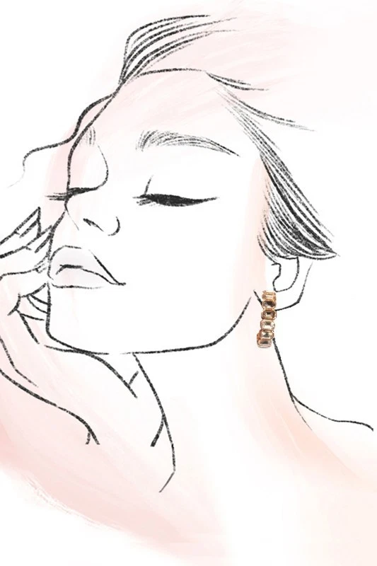 Pendientes de aro clásicos de diamantes de imitación chapados en oro con postes de titanio Foto 2 de 3