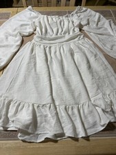 WHITE FULL DRESS, LONG WIDE SLEEVE, OPEN BACK WITH A BOW THAT TIES/SZ M