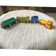 magnetic wooden train set appears compatible with brands Brio and Melissa Doug