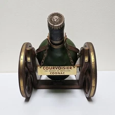 Courvoisier Cognac Bottle (Empty) In A Decorative Cannon Display
