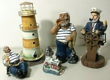 Nautical Décor Lot – Tall Tin Lighthouse & 3 Sailors + Ceramic Fishing Light