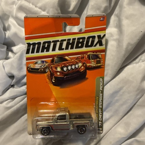 2010 MATCHBOX OUTDOOR SPORTSMAN '75 CHEVY STEPSIDE PICK UP SILVER NIB
