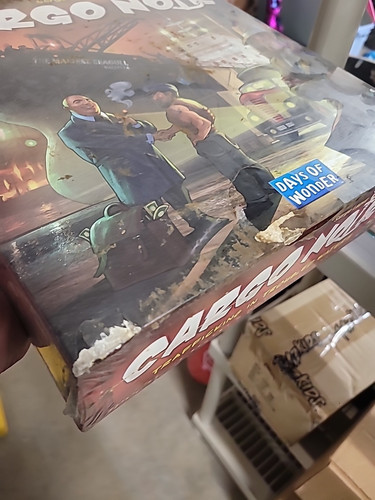 New SEALED Cargo Noir Days of Wonder Trafficking in Troubled Waters DAMAGED BOX - Picture 2 of 2