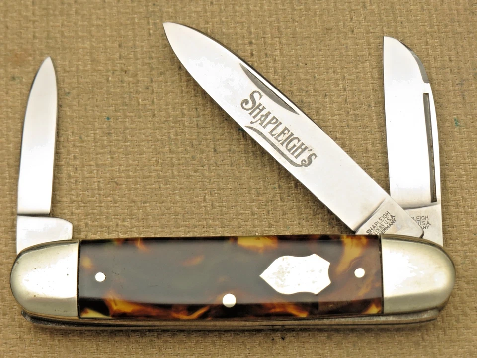 Cuchillo de ganado pequeño Shapleigh's Solingen de 1990 - asas ámbar coloridas - como nuevo Foto 2 de 4