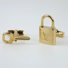 Louis Vuitton Padlock & Key Cufflinks M64601 Silver 925 Gold‑Plated Finish