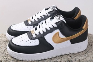 black white and gold air force ones