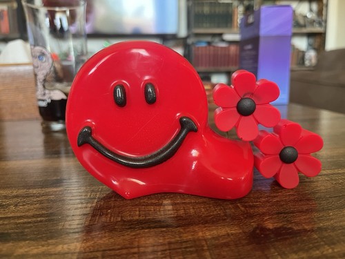 Smiley face resin art .