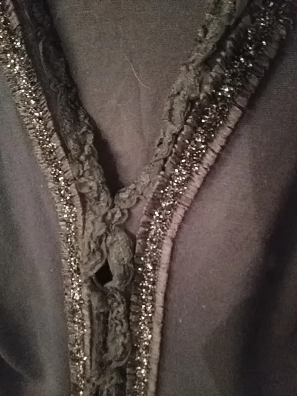 Suéter negro marca Carducci ojo y gancho M flecos brillantes cuello en V rayón poliéster Foto 2 de 4